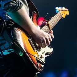 Close-up of Guitar Player
