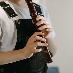 Young Girl Playing Recorder