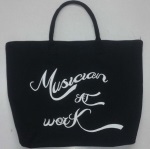 Musician at Work Tote Bag